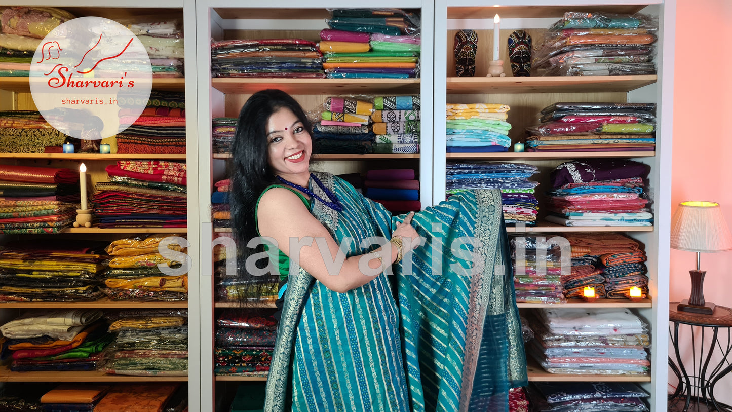 Teal Blue Banarasi Khaddi Georgette Saree with Ajrakh, Bandej and Leheriya Patterns