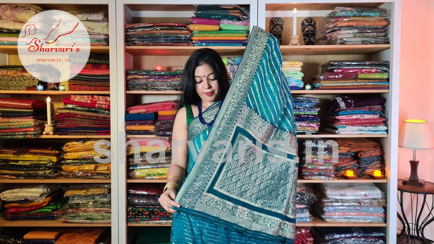 Teal Blue Banarasi Khaddi Georgette Saree with Ajrakh, Bandej and Leheriya Patterns