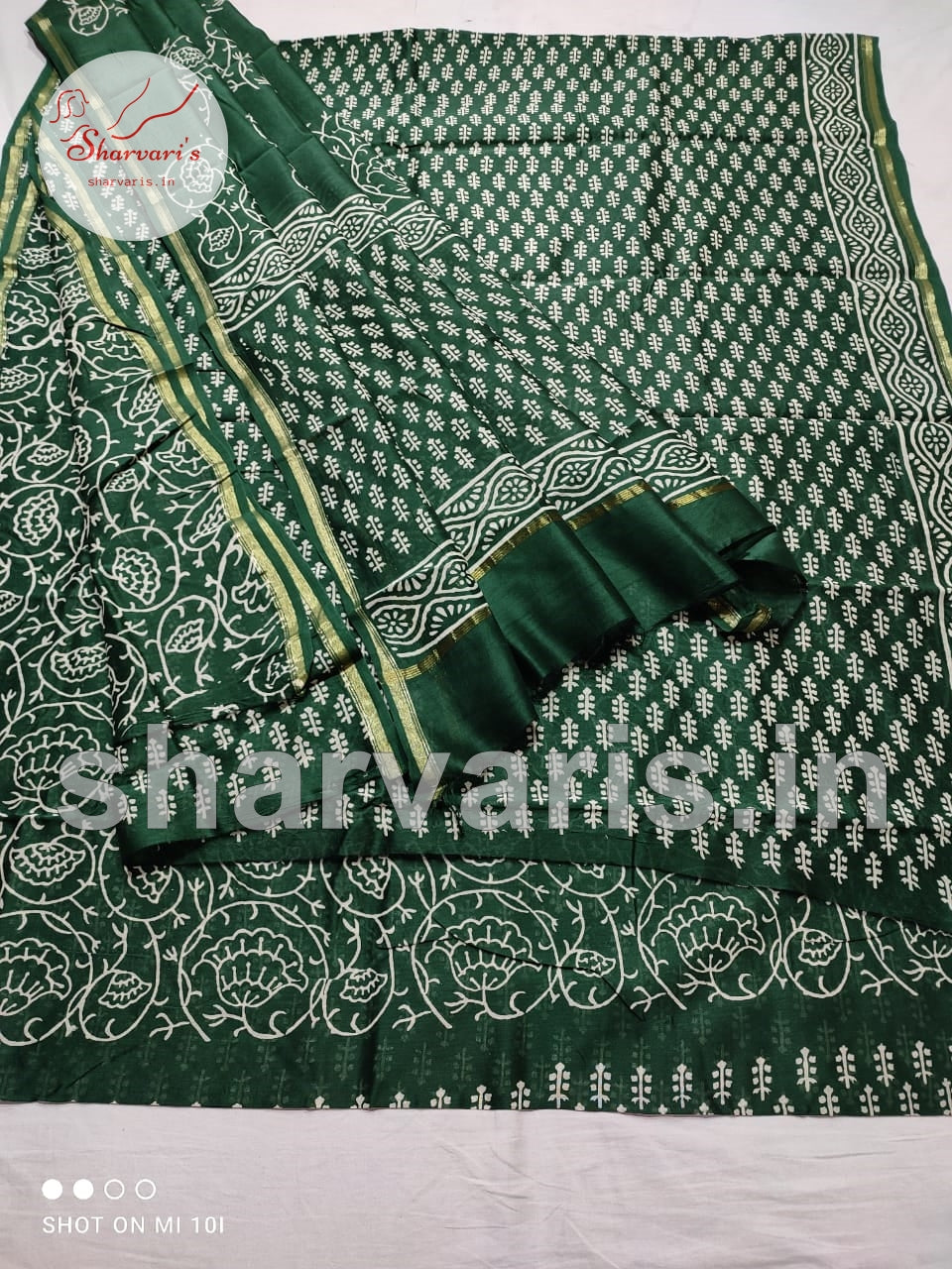 Bottle Green Chanderi Silk Cotton Dress Material with Dabu Prints