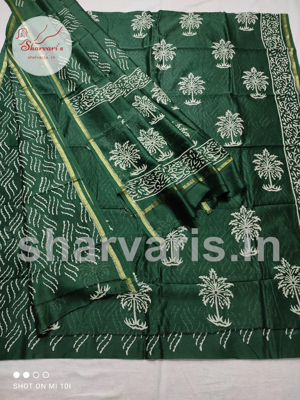 Bottle Green Chanderi Silk Cotton Dress Material with Dabu Prints