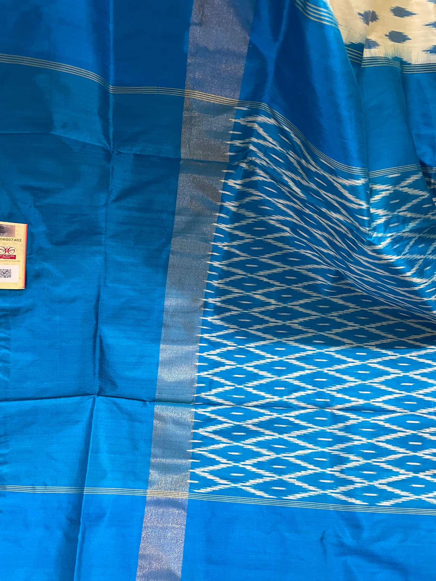 Off-White and Azure Blue Pochampally Silk Saree