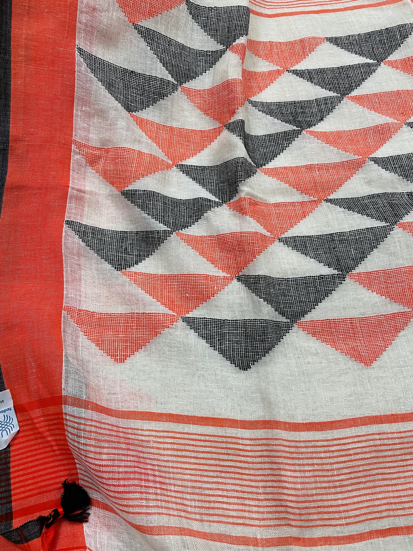 White Jamdani Linen Saree with Orange and Black Ganga Jamuna Borders