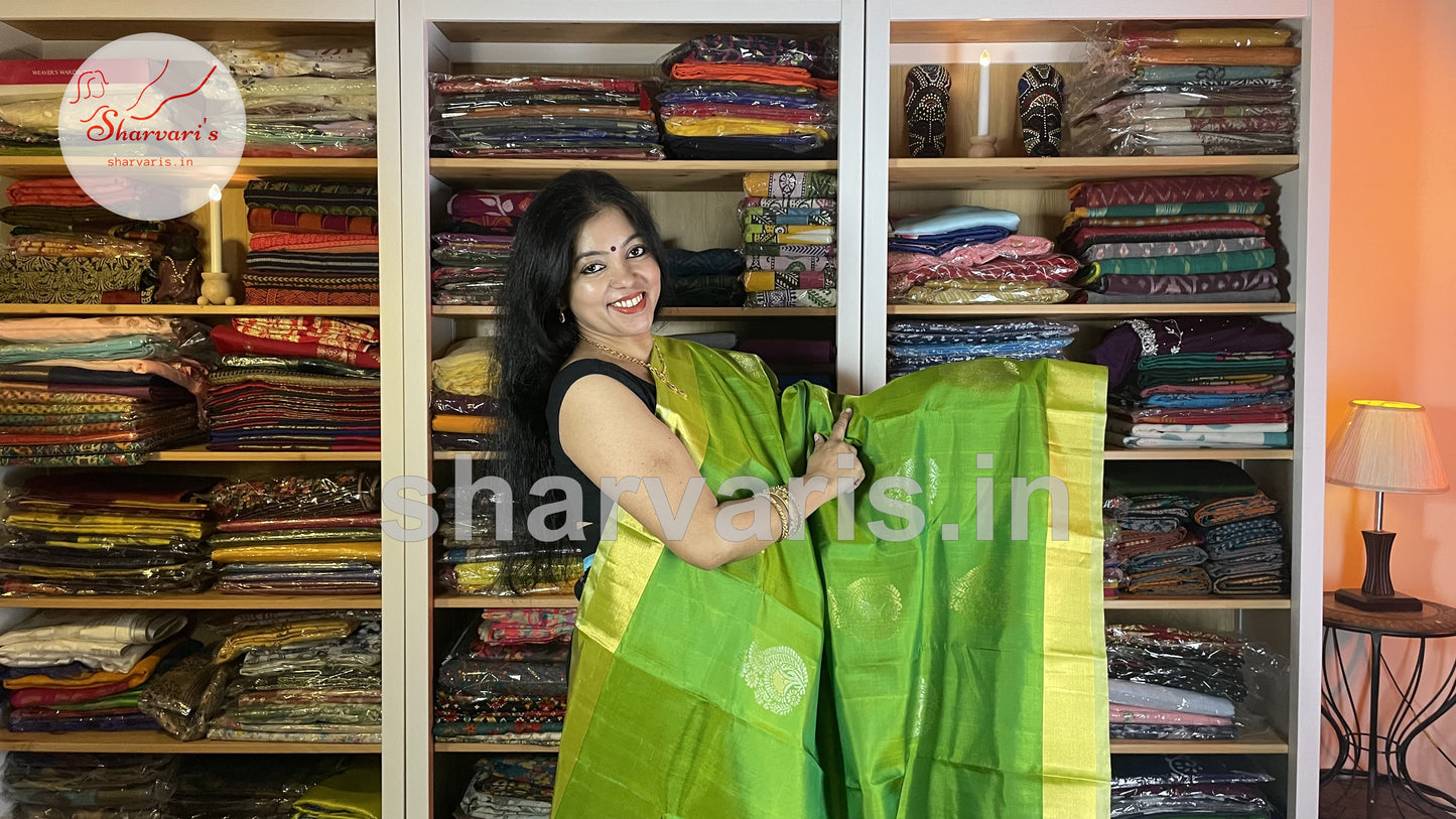 Parrot Green Pure Kanchipuram Silk Saree with Tissue Borders