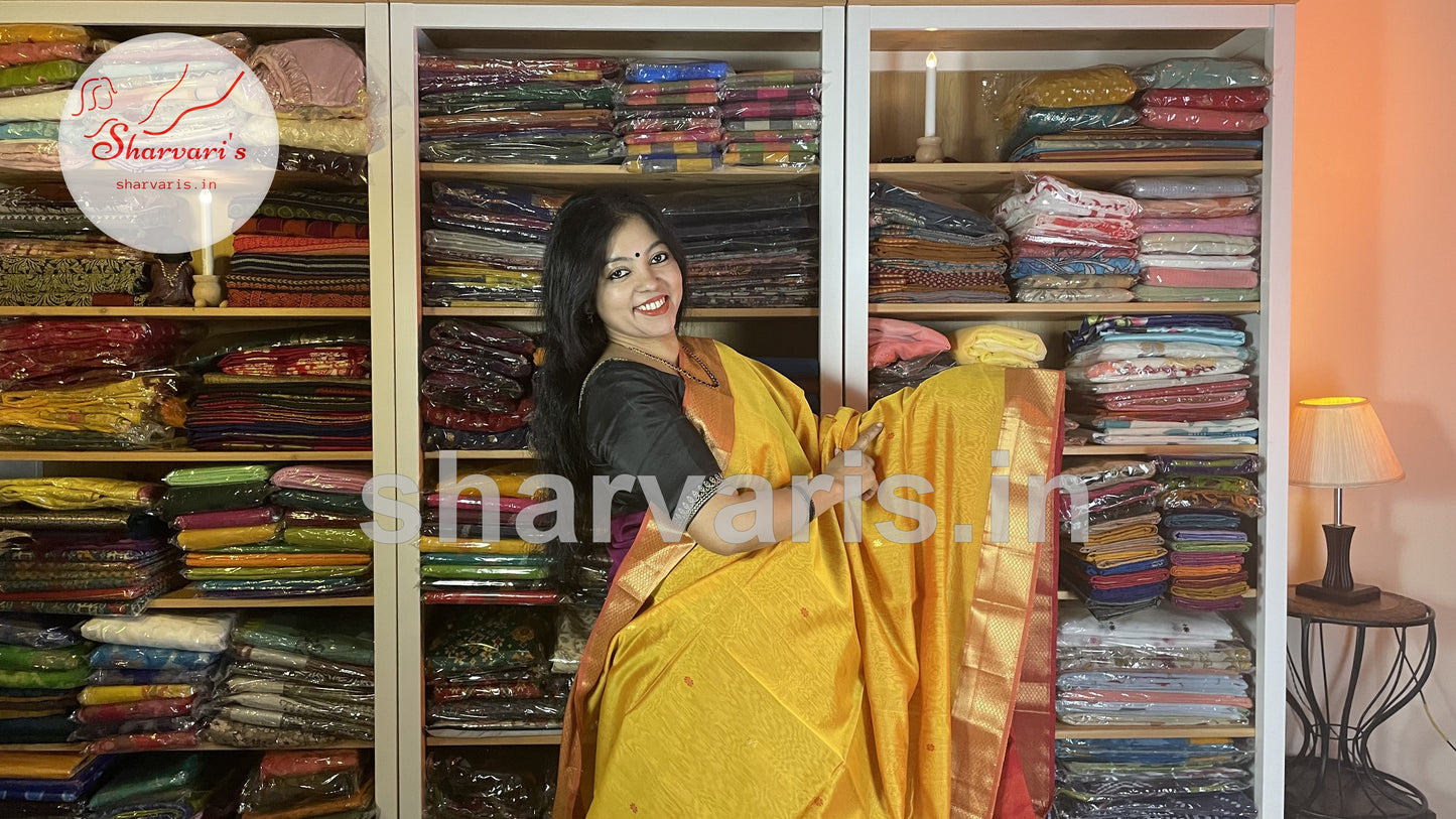 Yellow and Red Maheshwari Silk Cotton Saree with Floral Buttas and Rich Zari Borders