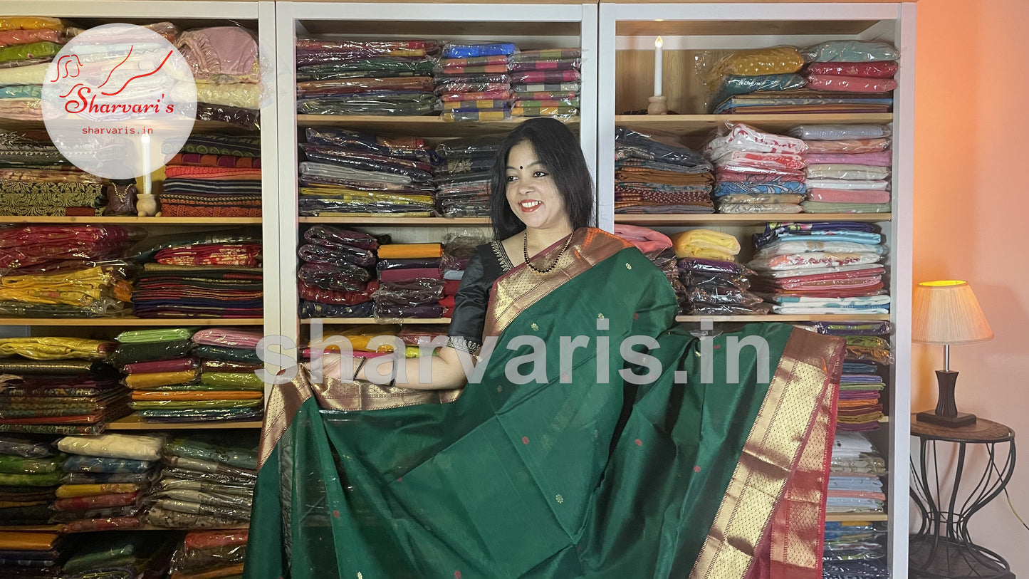 Bottle Green and Red Maheshwari Silk Saree with Floral Buttas and Rich Zari Borders