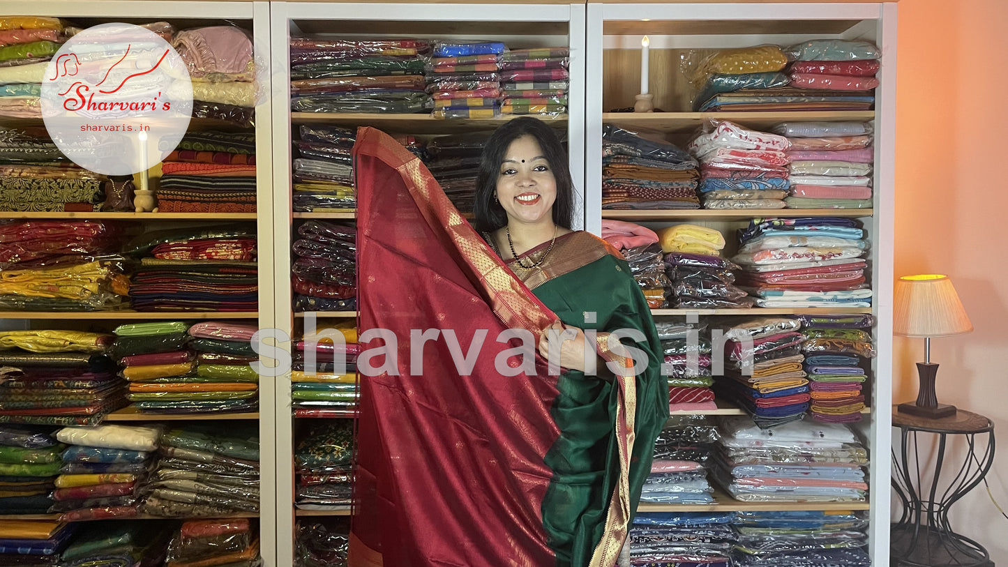 Bottle Green and Red Maheshwari Silk Saree with Floral Buttas and Rich Zari Borders