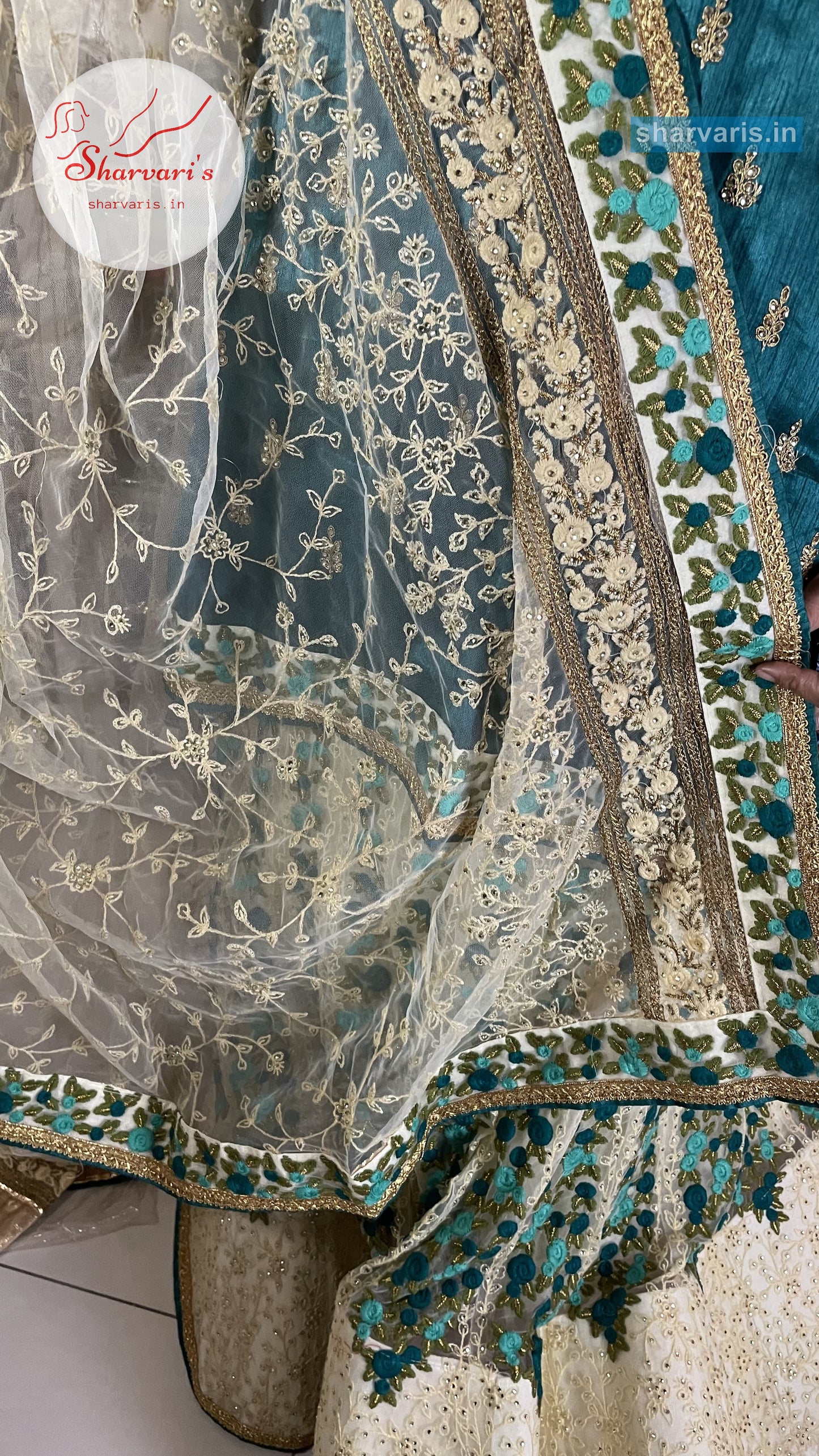 Off White and Peacock Green Party Wear Lehenga