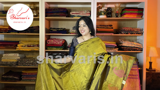 Pear Green Kanchipuram Silk Saree with Thread Work Motifs