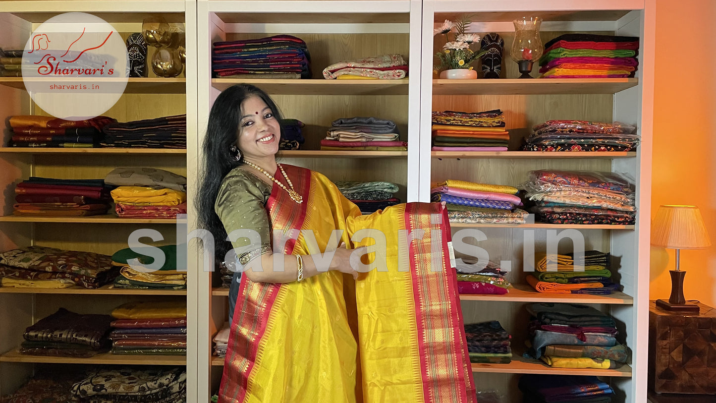 Yellow and Red Pure Gadwal Silk Saree with Kuttu Borders