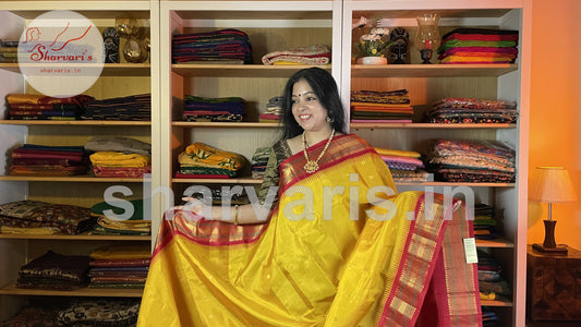 Yellow and Red Pure Gadwal Silk Saree with Kuttu Borders