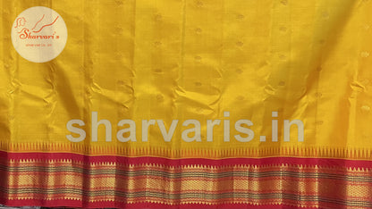 Yellow and Red Pure Gadwal Silk Saree with Kuttu Borders