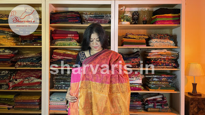 Pinkish Orange Silk Cotton Saree with Floral Pochampally Prints and Ganga Jamuna Borders