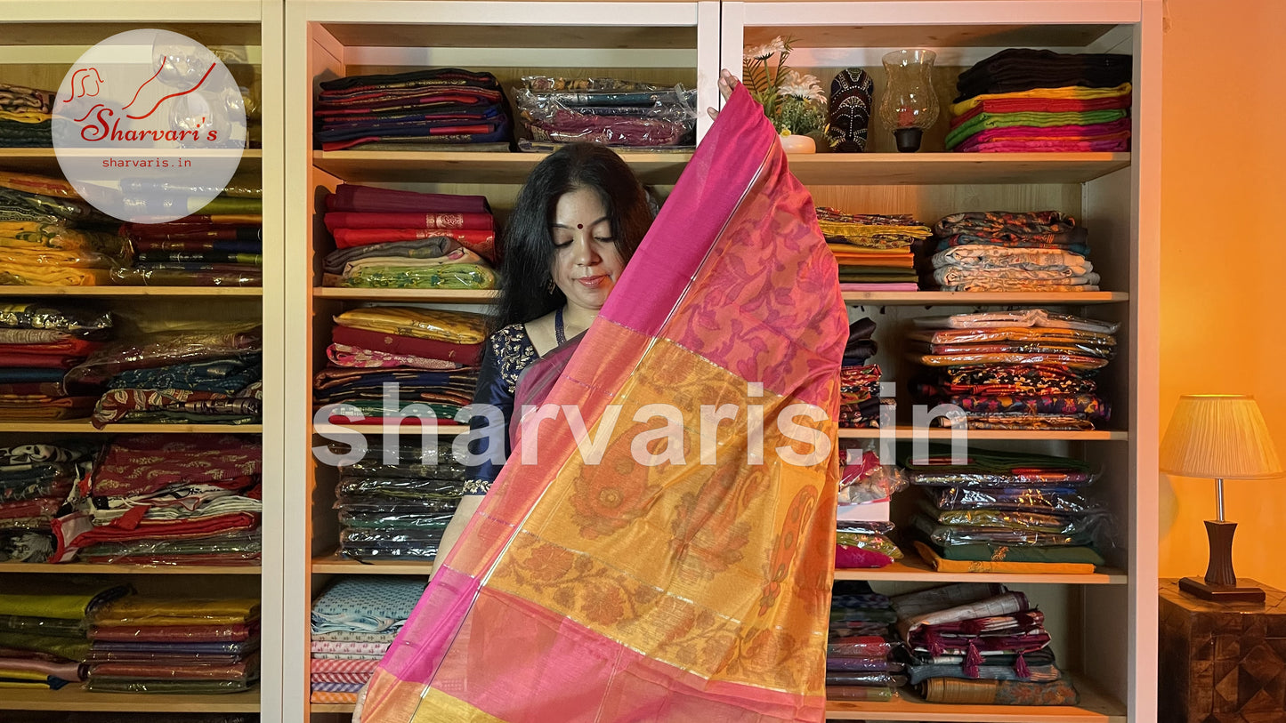 Pinkish Orange Silk Cotton Saree with Floral Pochampally Prints and Ganga Jamuna Borders