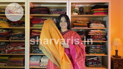 Pinkish Orange Silk Cotton Saree with Floral Pochampally Prints and Ganga Jamuna Borders