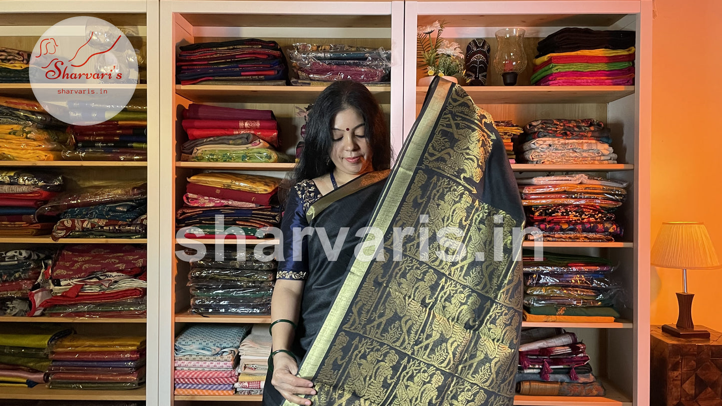 Handwoven Black Semi Raw Silk Saree with Tribal Art Threadwork Patterns