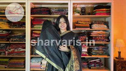 Handwoven Black Semi Raw Silk Saree with Tribal Art Threadwork Patterns