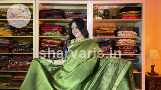 Green Semi Raw Silk Handwoven Saree with Tribal Art Threadwork Patterns