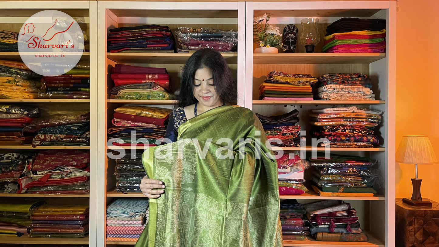 Green Semi Raw Silk Handwoven Saree with Tribal Art Threadwork Patterns