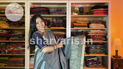 Handwoven Slate Grey Semi Raw Silk Saree with Tribal Art Threadwork Patterns