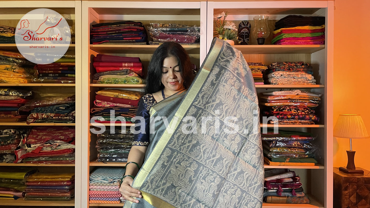 Handwoven Slate Grey Semi Raw Silk Saree with Tribal Art Threadwork Patterns