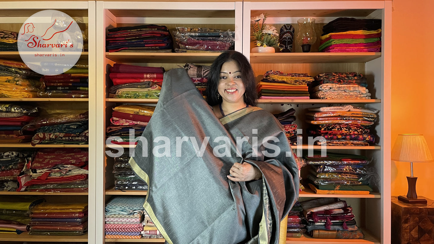 Handwoven Slate Grey Semi Raw Silk Saree with Tribal Art Threadwork Patterns