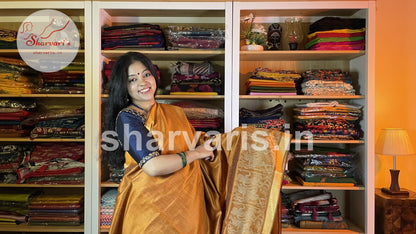 Handwoven Golden Mustard Semi Raw Silk Saree with Tribal Art Threadwork Patterns