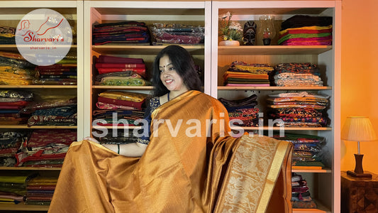 Handwoven Golden Mustard Semi Raw Silk Saree with Tribal Art Threadwork Patterns