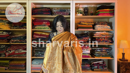 Handwoven Golden Mustard Semi Raw Silk Saree with Tribal Art Threadwork Patterns