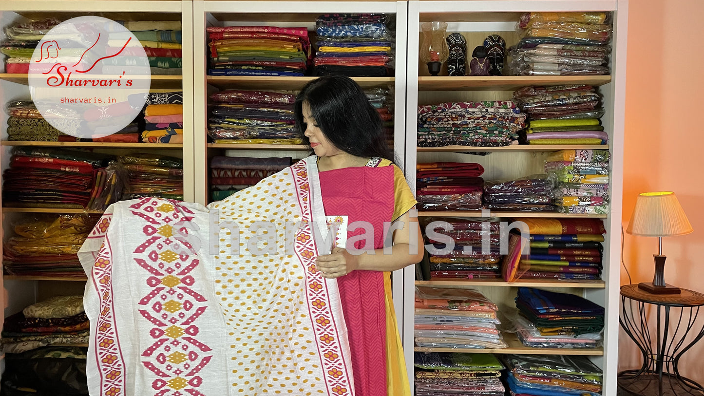 Rani Pink and Mustard Yellow Blended Cotton Dress Material with Ikkat Print Dupatta