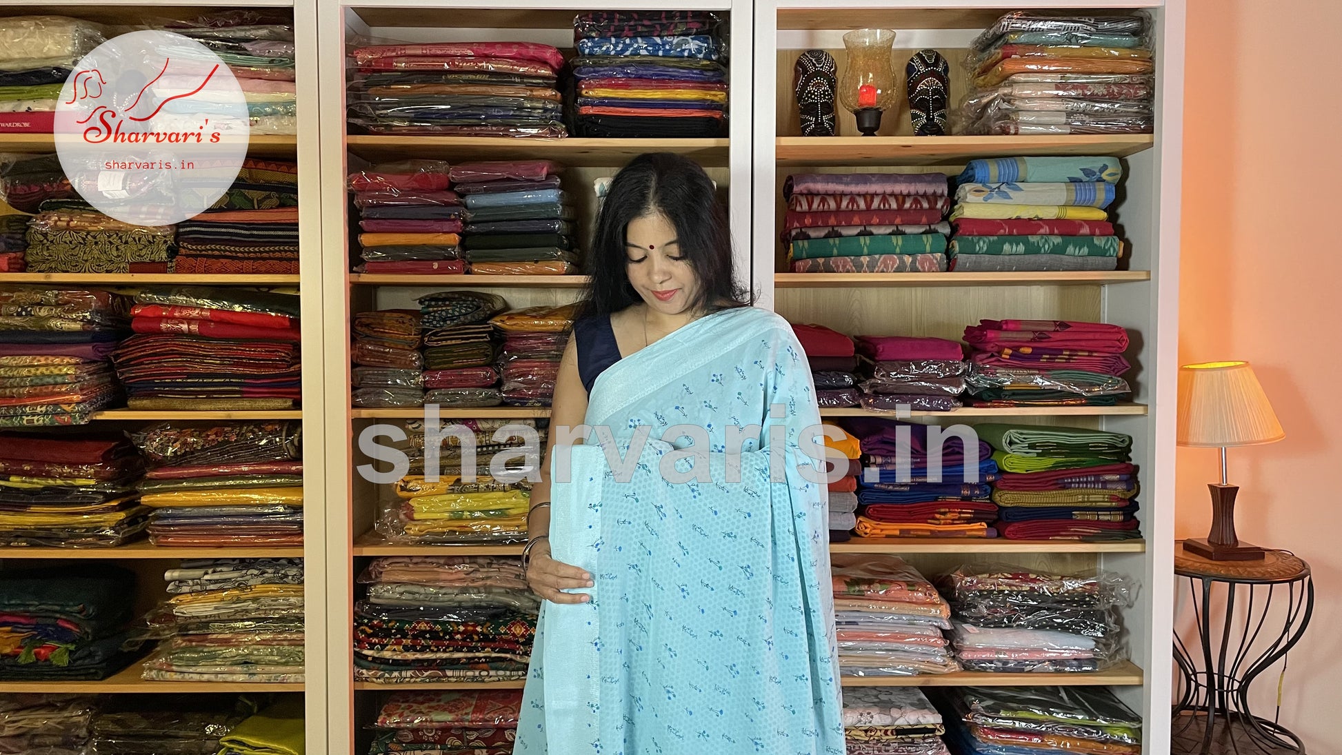 sky blue smooth chiffon saree with cute floral prints