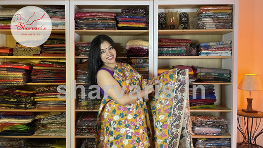 Mustard Yellow and Green Kalamkari Semi Silk Saree