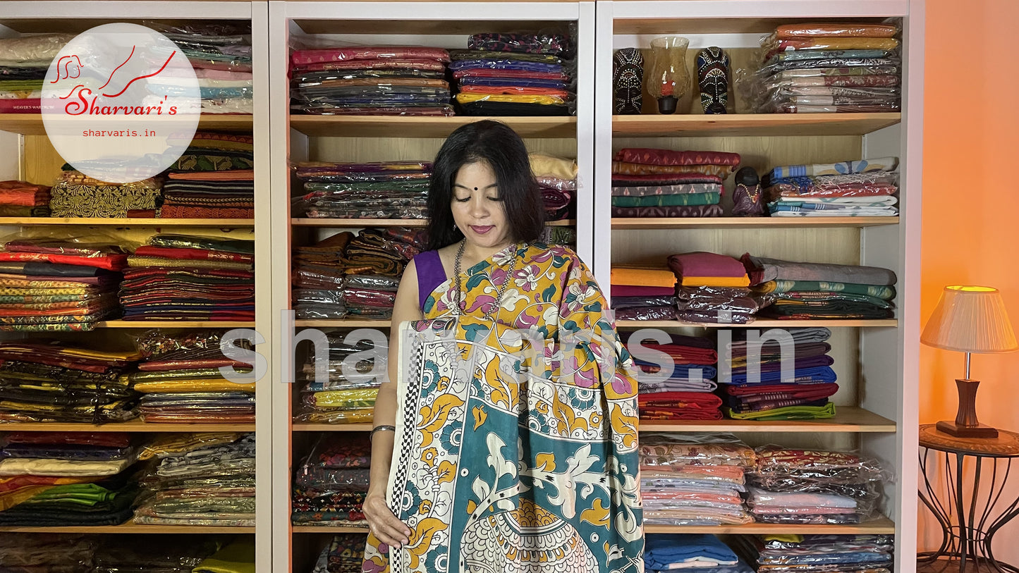 Mustard Yellow and Green Kalamkari Semi Silk Saree