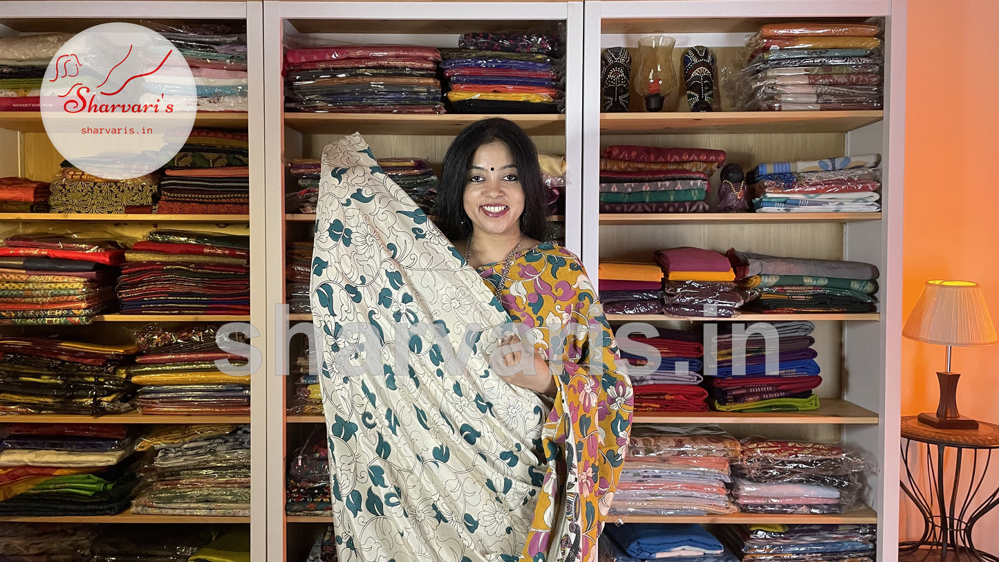 Mustard Yellow and Green Kalamkari Semi Silk Saree