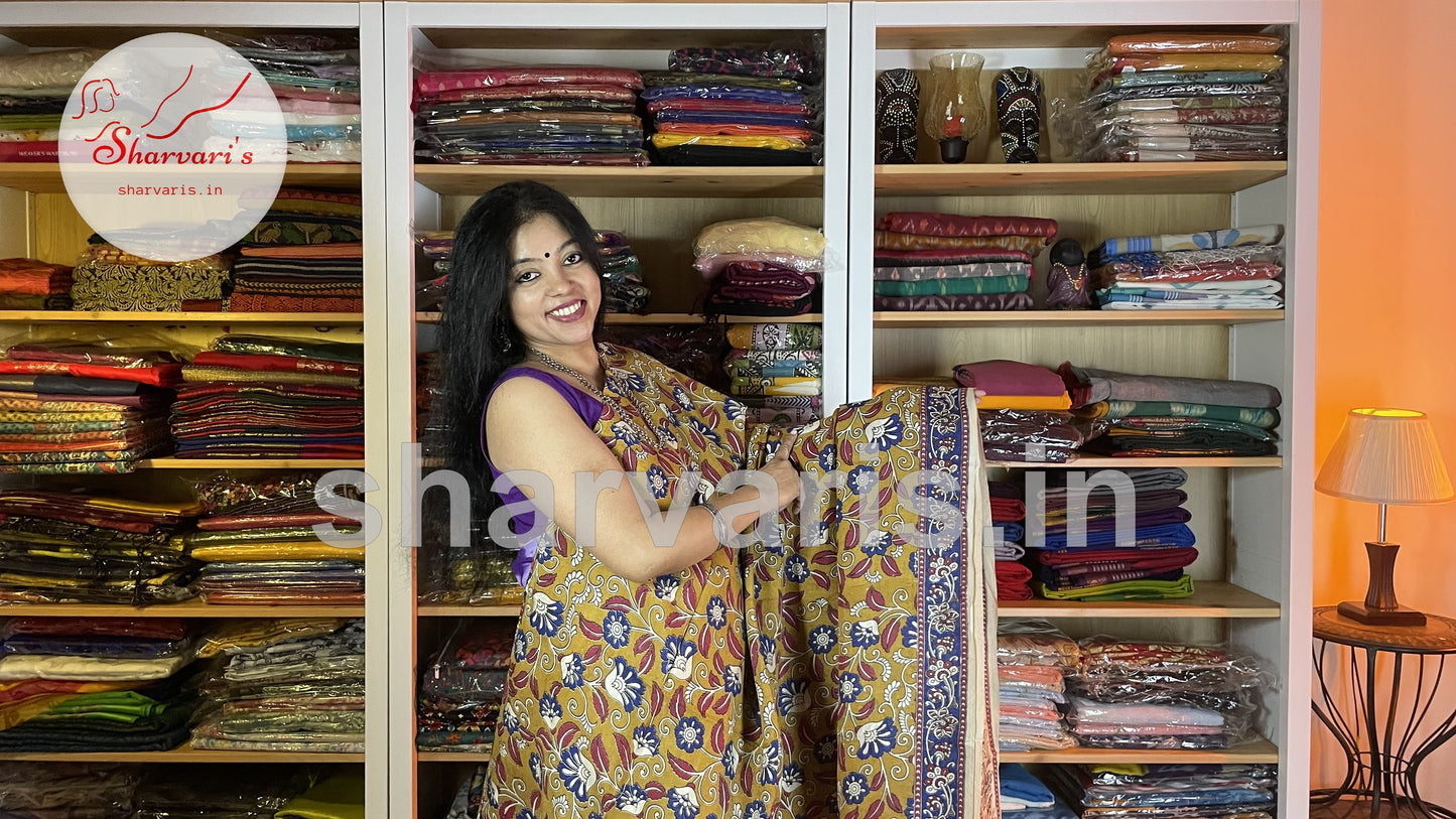 Mustard Yellow and Blue Kalamkari Semi Silk Saree